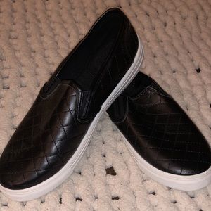 Black platform slip ons